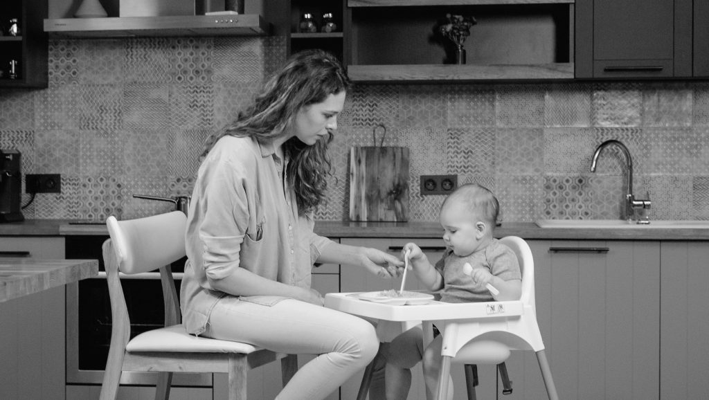Mother feeding baby